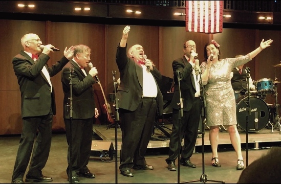 Image13Enh A quartet singing with the Silver Tones Swing Band.