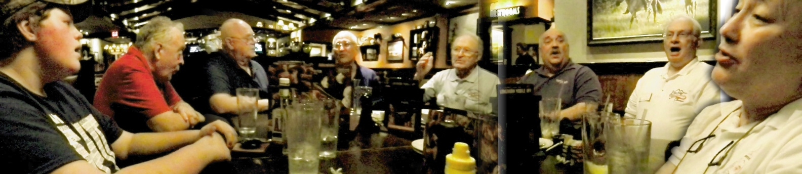 LonghornTable1 Part of the chorus singing around a table at Longhorn Steakhouse.