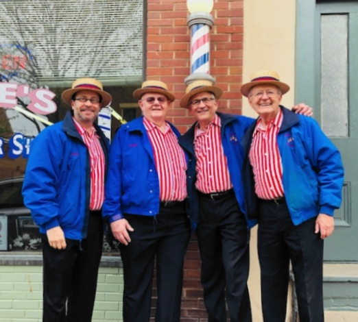 MintCondition April 2019 MintCondition April 2019 in front of a barbershop.